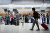 A global technology outage had grounded flights, disrupted hospitals and backed up border crossings in Canada on Friday, as reported issues persisted hours after the issues with Microsoft services were said to be getting fixed. Passengers are seen at Pearson International Airport, in Toronto, Saturday, June 29, 2024. THE CANADIAN PRESS/Christopher Katsarov”