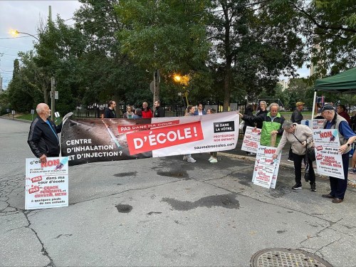 Demonstrators hold a protest against the construction of a supervised drug-use site in Montreal on Sept. 19, 2023. THE CANADIAN PRESS/Thomas MacDonald