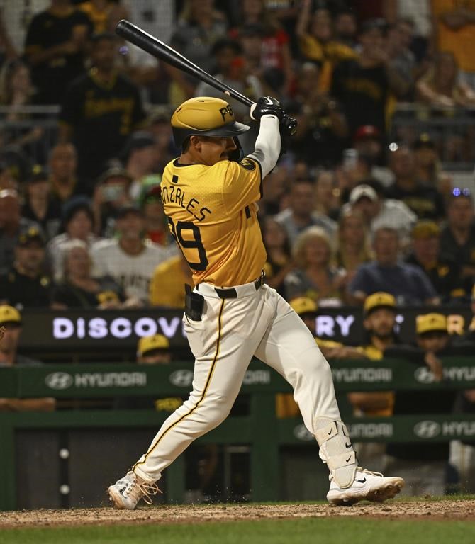 Pittsburgh Pirates' Nick Gonzales hits a walkoff single off Philadelphia Phillies relief pitcher José Alvarado during the ninth inning of a baseball game in Pittsburgh, Friday, July 19, 2024. (AP Photo/Justin Berl)