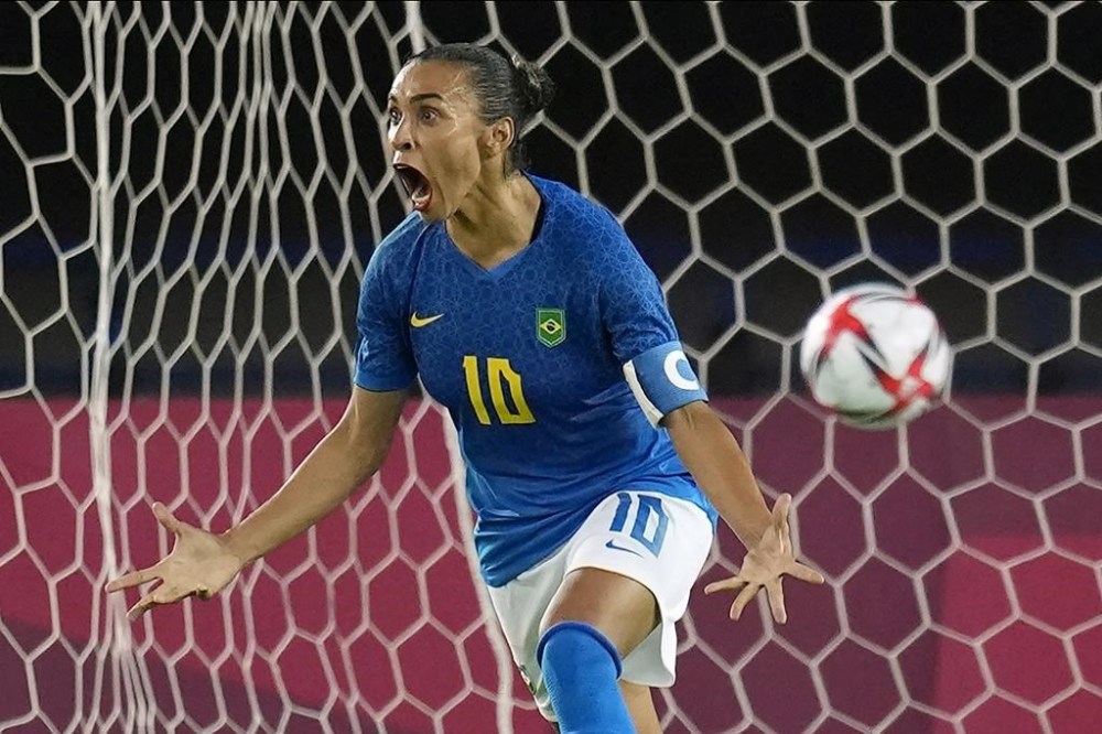 FILE - Brazil's Marta celebrates after scoring a goal during a women's soccer match against Netherlands at the 2020 Summer Olympics, Saturday, July 24, 2021, in Miyagi, Japan. The Brazilian legend plays in her final Olympics in France before stepping away from the national team. (AP Photo/Andre Penner, File)