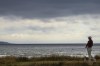 Rory McIlroy of Northern Ireland watches his tee shot on the fifth hole during his second round of the British Open Golf Championships at Royal Troon golf club in Troon, Scotland, Friday, July 19, 2024. (AP Photo/Peter Morrison)
