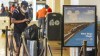 Retired IT Technician William Taylor lines up to purchase a four-day train ride ticket to Jackson, Mississippi, at Union Station in Los Angeles, Friday, July 19, 2024, as a widespread Microsoft outage disrupted flights, banks, media outlets, and companies worldwide. (AP Photo/Damian Dovarganes)
