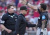 Miami Marlins' Dane Myers, right, reacts after being ejected by home plate umpire Derek Thomas, left, as manager Skip Schumaker, center, intervenes during the eighth inning of a baseball game against the Cincinnati Reds, Saturday, July 13, 2024, in Cincinnati. (AP Photo/Jeff Dean)