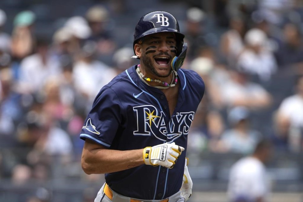 Tampa Bay Rays' Jose Siri runs to first base after hitting a single during the fourth inning of a baseball game against the New York Yankees, Saturday, July 20, 2024, in New York. (AP Photo/Pamela Smith)