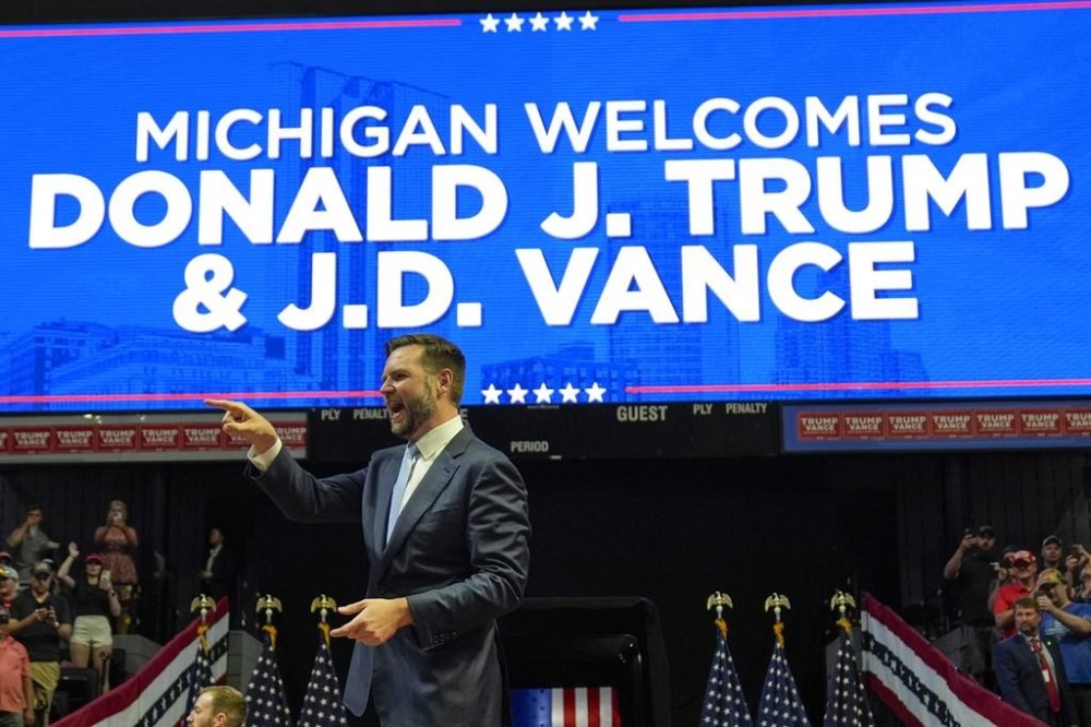 Republican vice presidential candidate Sen. JD Vance, R-Ohio, of Ohio arrives to speak before Republican presidential candidate former President Donald Trump at a campaign rally, Saturday, July 20, 2024, in Grand Rapids, Mich. (AP Photo/Evan Vucci)