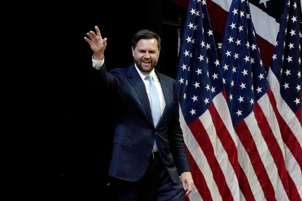Republican vice presidential candidate Sen. JD Vance, R-Ohio, arrives to speak at a campaign event with Republican presidential candidate former President Donald Trump, Saturday, July 20, 2024, at Van Andel Arena in Grand Rapids, Mich. (AP Photo/Carlos Osorio)