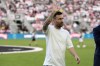 Inter Miami forward Lionel Messi waves as he walks off the field after being honored for his 45 career trophies before an MLS soccer match against the Chicago Fire, Saturday, July 20, 2024, in Fort Lauderdale, Fla. (AP Photo/Lynne Sladky)