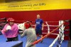 U.S. Olympic boxer Jajaira Gonzalez, left, spars with teammate Jennifer Lozano while head coach Billy Walsh looks on at the U.S. Olympic Training Center in Colorado Springs, Colo., June 14, 2024. Eight years after Gonzalez narrowly missed out on qualification for the Rio de Janeiro Games, she revived her boxing career and earned an Olympic berth in Paris. (AP Photo/Greg Beacham)