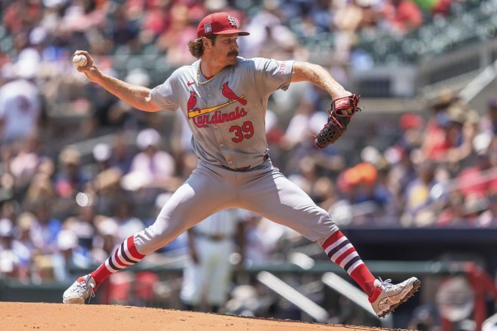 St. Louis Cardinals pitcher Miles Mikolas throws in the third inning of a baseball game against the Atlanta Braves, Sunday, July 21, 2024, in Atlanta. (AP Photo/Jason Allen)