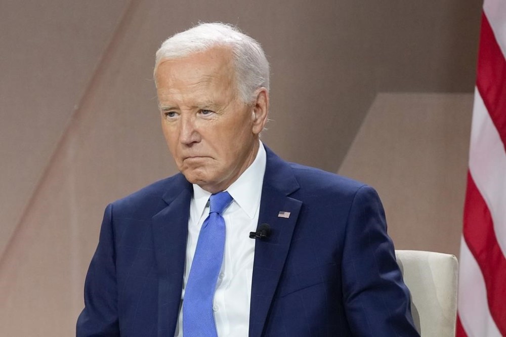 FILE - President Joe Biden attends an event on the sidelines of the NATO Summit in Washington, July 11, 2024. Biden dropped out of the 2024 race for the White House on Sunday, July 21, ending his bid for reelection following a disastrous debate with Donald Trump that raised doubts about his fitness for office just four months before the election. (AP Photo/Susan Walsh, File)