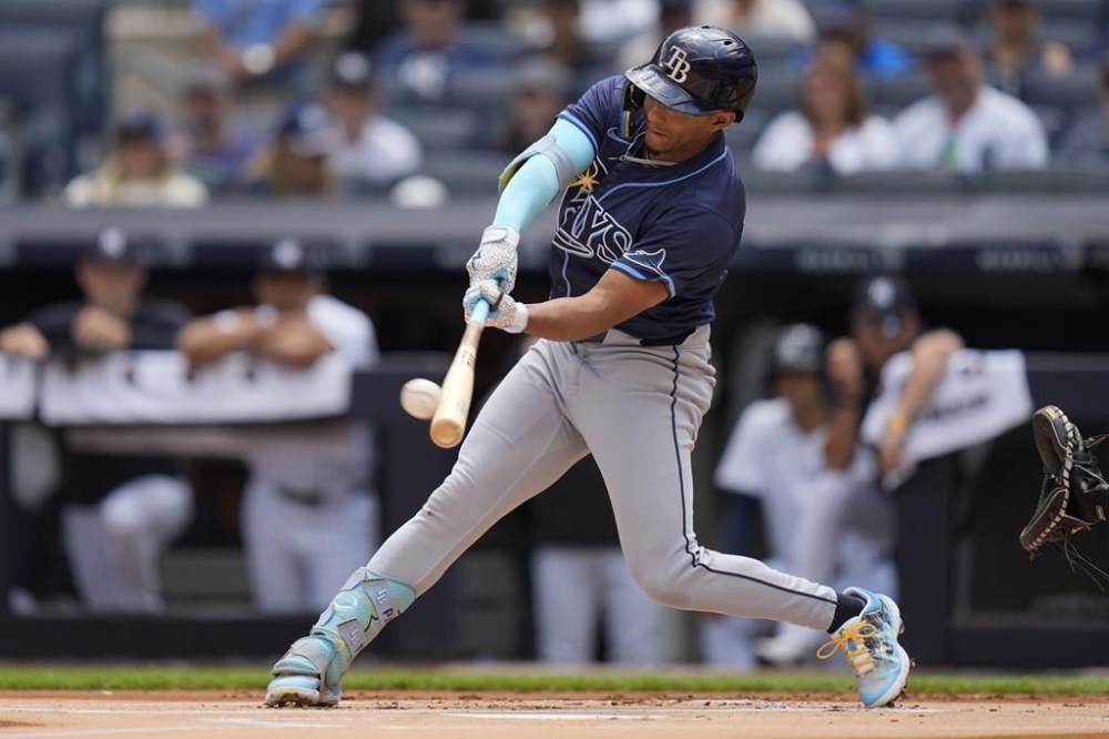 Tampa Bay Rays' Richie Palacios hits a solo home run during the first inning of the baseball game against the New York Yankees, Sunday, July 21, 2024, in New York. (AP Photo/Seth Wenig)
