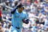 Toronto Blue Jays fielder George Springer (4) circles the bases after hitting a solo home run against the Detroit Tigers batter in first inning American League baseball action in Toronto on Sunday, July 21, 2024. THE CANADIAN PRESS/Jon Blacker