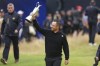 Xander Schauffele of the United States holds the Claret Jug trophy after winning the British Open Golf Championships at Royal Troon golf club in Troon, Scotland, Sunday, July 21, 2024. (AP Photo/Peter Morrison)
