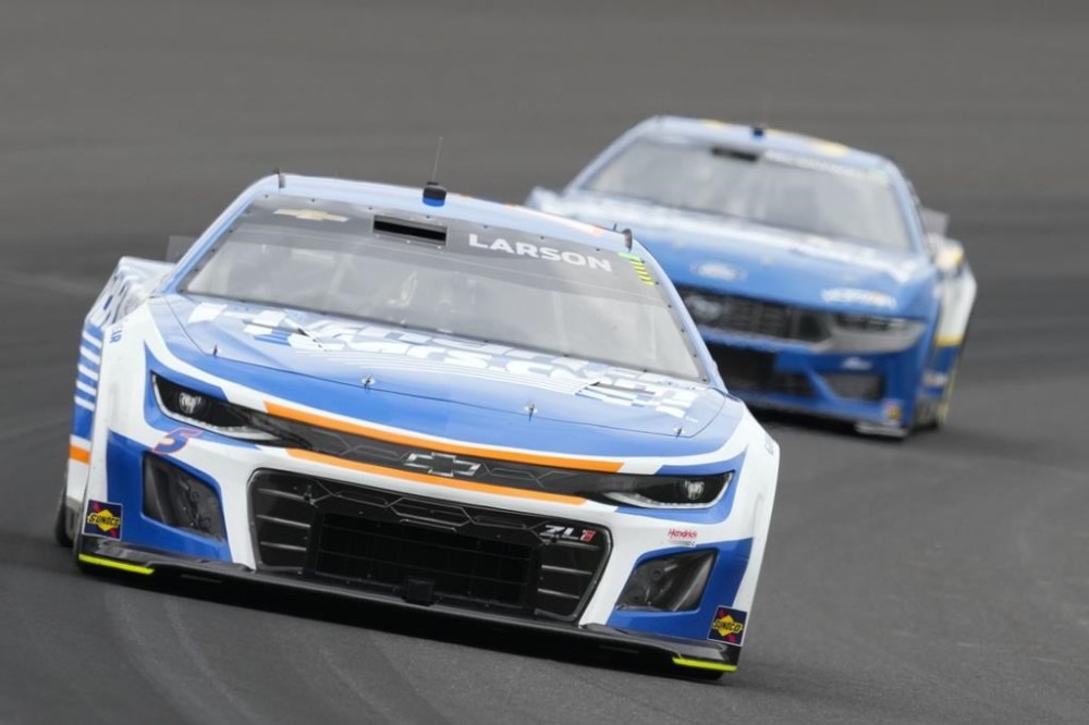 Kyle Larson drives out of a turn during a NASCAR Cup Series auto race at Indianapolis Motor Speedway, Sunday, July 21, 2024, in Indianapolis. (AP Photo/Darron Cummings)
