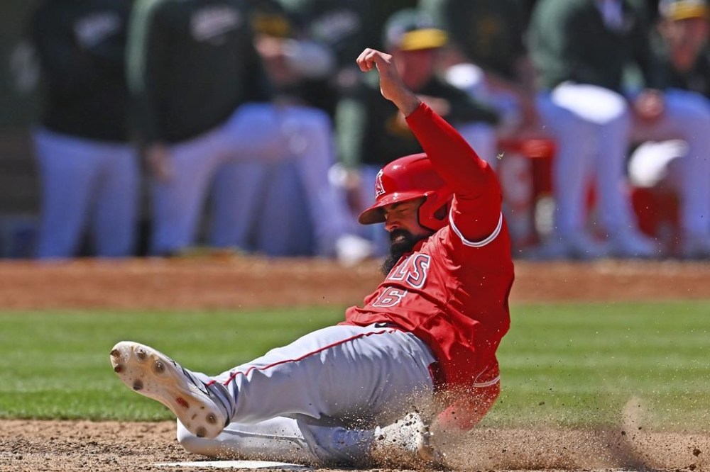 Los Angeles Angels' Anthony Rendon scores on two-run double by teammate Kevin Pillar during the eighth inning of a baseball game against the Oakland Athletics in Oakland, Calif., Sunday, July 21, 2024. (Jose Carlos Fajardo/Bay Area News Group via AP)