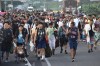Migrants walk along the highway through Suchiate, Chiapas state in southern Mexico, Sunday, July 21, 2024, during their journey north toward the U.S. border. (AP Photo/Edgar H. Clemente)