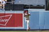 Boston Red Sox center fielder Ceddanne Rafaela catches out a fly ball hit by Los Angeles Dodgers' Miguel Rojas during the first inning of a baseball game, Sunday, July 21, 2024, in Los Angeles. (AP Photo/Ryan Sun)