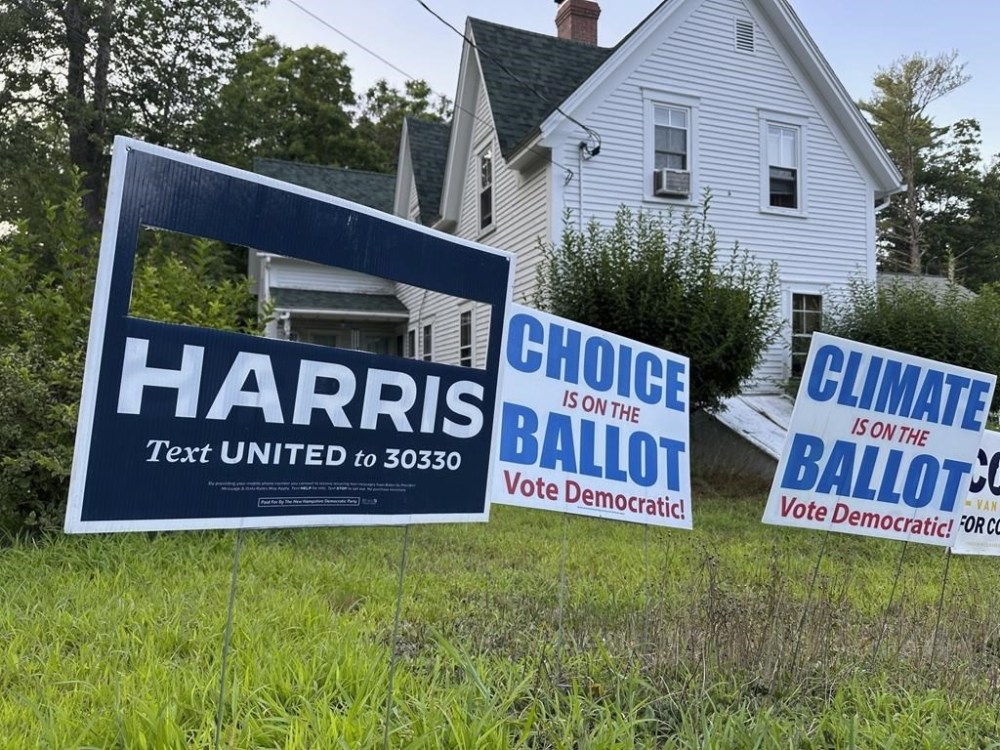 A campaign sign with President Joe Biden's name cut out stands in Northwood, N.H., Sunday, July 21, 2024. Homeowner Tom Chase, 79, said he removed Biden's name last week and was relieved and delighted that the president withdrew from his 2024 campaign and endorsed Vice President Kamala Harris. (AP Photo/Holly Ramer)