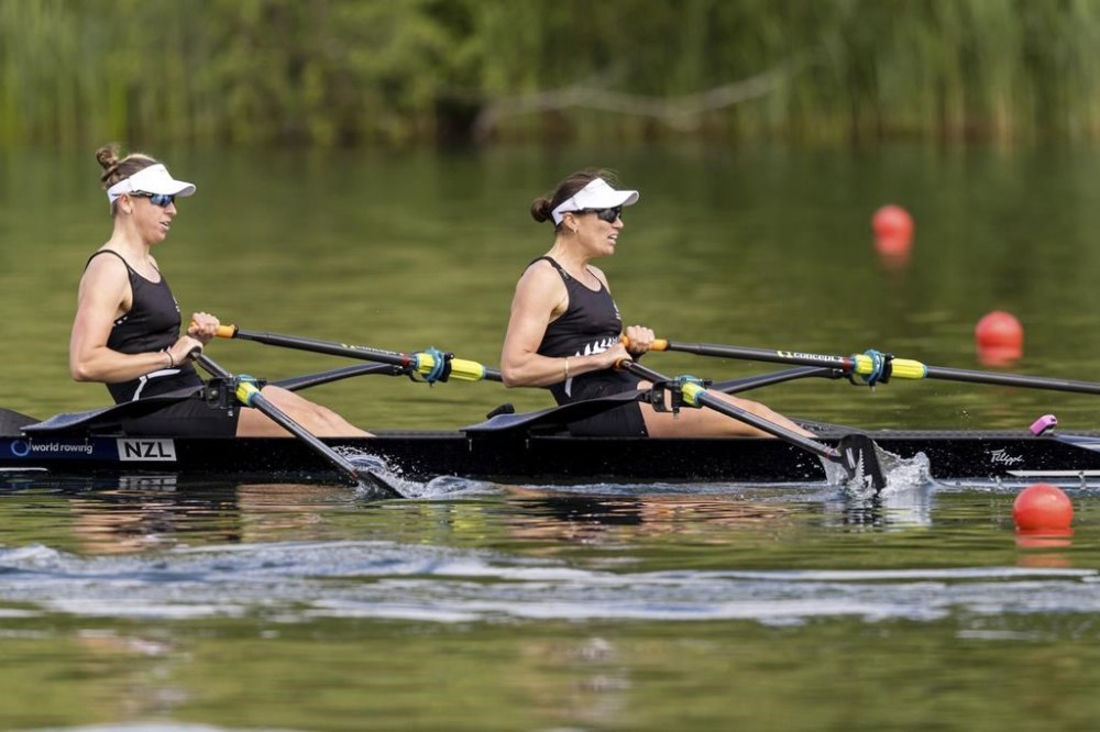FILE - Brooke Francis, left, and Lucy Spoors of New Zealand compete in the Women's Double Sculls semi final on the second day of the 2024 World Rowing Cup at Rotsee, in Lucerne, Switzerland, Saturday, May 25, 2024. (Philipp Schmidli/Keystone via AP, File)
