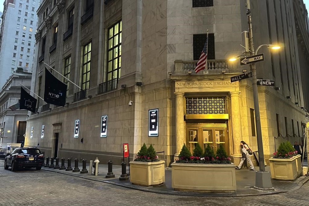 FILE - An entrance to the New York Stock Exchange is shown on May 8, 2024, in New York. (AP Photo/Peter Morgan, File)