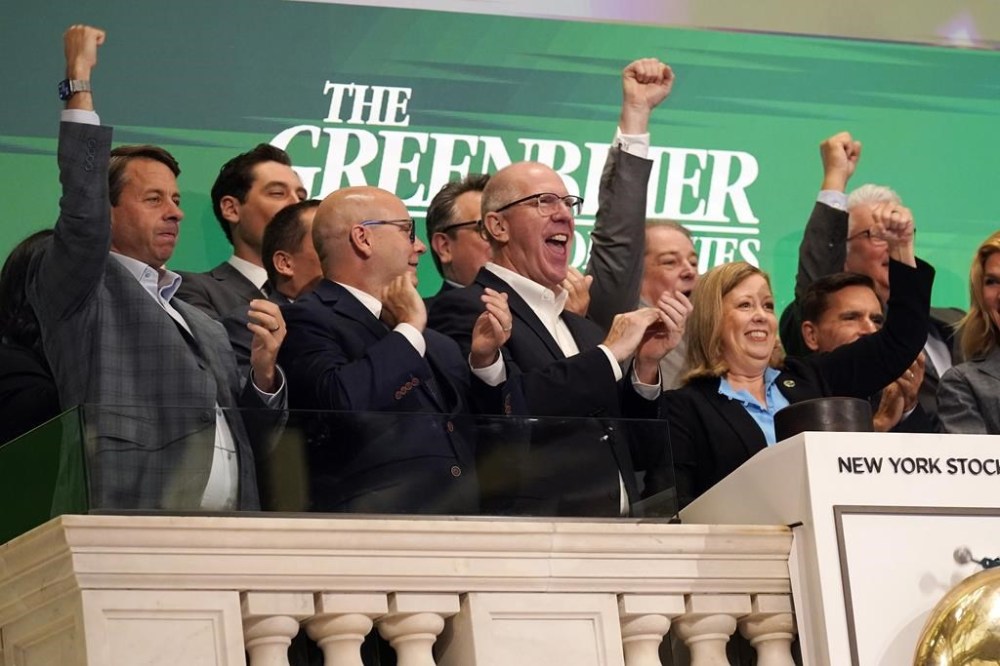 The Greenbrier Companies, Inc. CEO & President Lorie Tekorius, right, rings the opening bell of the New York Stock Exchange, Monday, July 22, 2024. (AP Photo/Richard Drew)