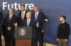 Britain's Prime Minister Sir Keir Starmer, left, and Ukrainian President Volodymyr Zelenskyy, right, look on as U.S. President Joe Biden speaks during an event on the Ukraine Compact at the NATO Summit at the Walter E. Washington Convention Center, in Washington, Thursday, July 11, 2024. Biden launched the Ukraine Compact, signed by 25 countries and the European Union, as part of a commitment to Ukraine's long term security. (Stefan Rousseau/Pool Photo via AP)