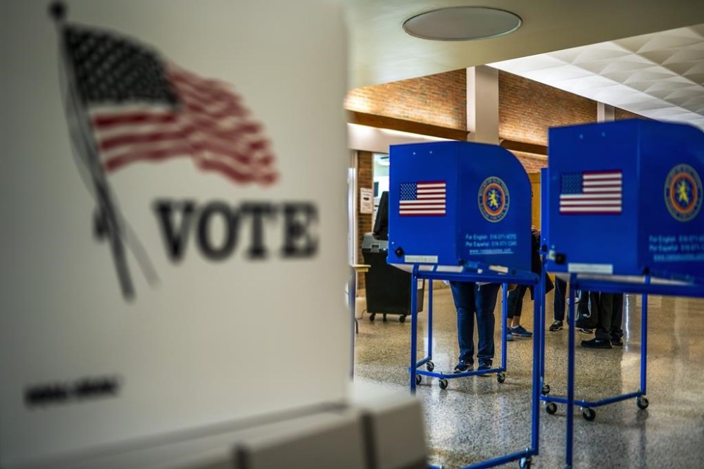 FILE - A voting center is pictured during early voting in the states' presidential primary election, March 26, 2024, in Freeport, N.Y. Even before President Joe Biden's withdrawal from the 2024 presidential race, allies of former President Donald Trump floated the possibility of suing to block Democrats from having anyone other than Biden on the ballot in November. But election administration experts say the timing of Biden's exit makes it unlikely that any Republican ballot access challenges will succeed, with some calling the idea