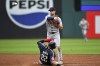 Detroit Tigers' Colt Keith (33) forces out Cleveland Guardians' Josh Naylor (22) at second base and throws out Guardians' David Fry at first base to complete a double play during the third inning of a baseball game, Monday, July 22, 2024, in Cleveland. (AP Photo/Nick Cammett)