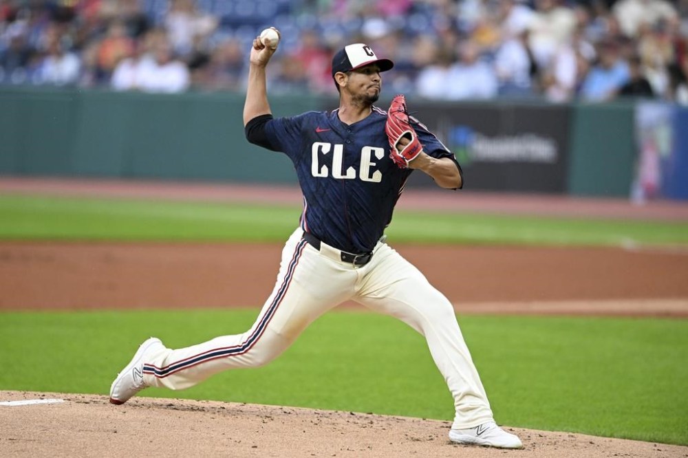 Cleveland Guardians pitcher Carlos Carrasco delivers during the first inning of a baseball game against the Detroit Tigers, Monday, July 22, 2024, in Cleveland. (AP Photo/Nick Cammett)