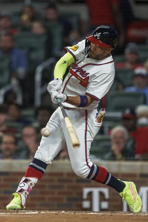 Atlanta Braves' Eddie Rosario swings in the seventh inning of a baseball game against the Cincinnati Reds, Monday, July 22, 2024, in Atlanta. (AP Photo/Jason Allen)