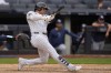 New York Yankees' Juan Soto follows through on a three-run homer during the eighth inning of a baseball game against the Tampa Bay Rays at Yankee Stadium Monday, July 22, 2024, in New York. (AP Photo/Seth Wenig)