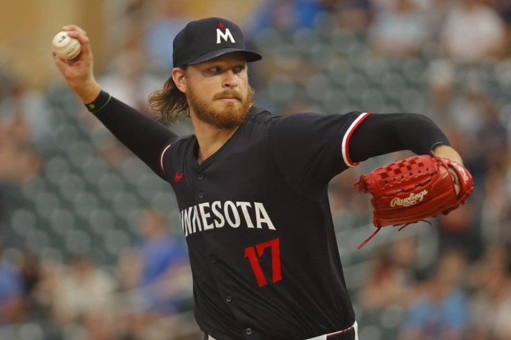 Minnesota Twins starting pitcher Bailey Ober throws to the Philadelphia Phillies in the first inning of a baseball game Monday, July 22, 2024, in Minneapolis. (AP Photo/Bruce Kluckhohn)