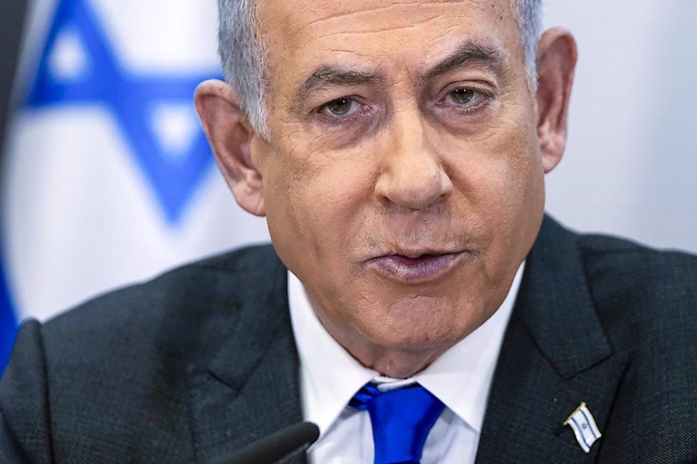FILE - Israeli Prime Minister Benjamin Netanyahu chairs a cabinet meeting at the Kirya military base in Tel Aviv, Israel, on Dec. 24, 2023. Netanyahu's visit to Washington this week is looming as a particularly fraught one between two allies. The Israeli leader is coming to address Congress Wednesday, July 24, 2024, at a moment of extreme political flux in the United States. (AP Photo/Ohad Zwigenberg, Pool, File)