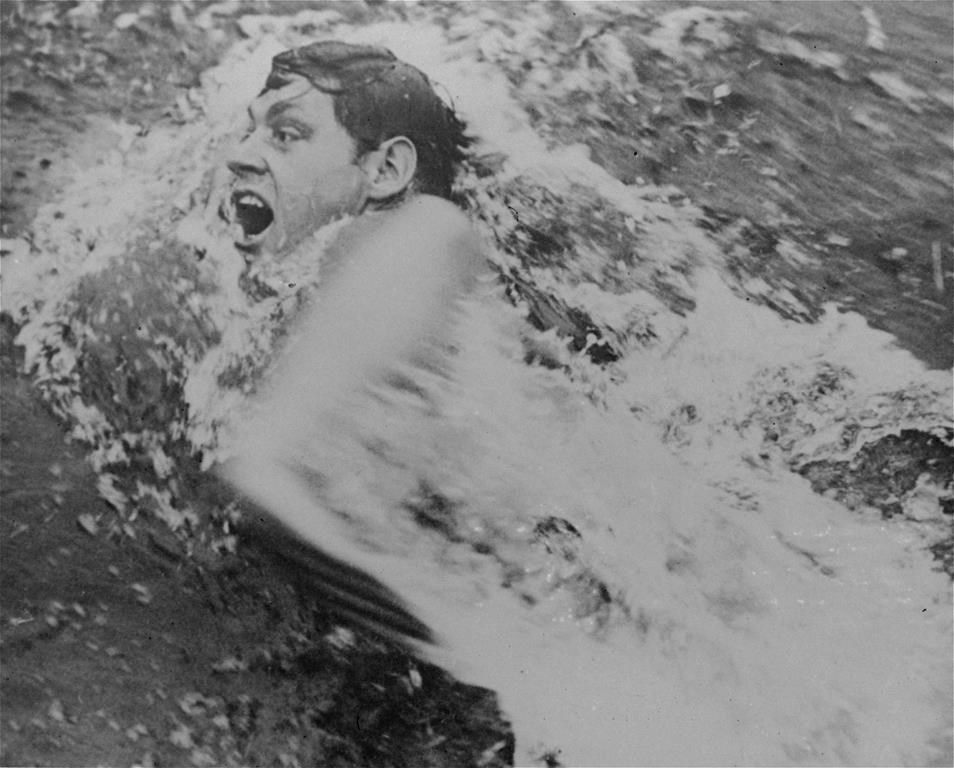 FILE - Johnny Weissmuller competes in an international swimming tournament at the Tamagawa pool on the outskirts of Tokyo, Nov. 1928. Weissmuller played Tarzan in the films but was a swimming superstar in France 100 years ago. (AP Photo, File)