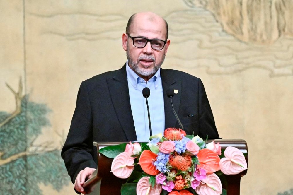 Mussa Abu Marzuk of Hamas speaks during an event for him and Mahmoud al-Aloul of Fatah to meet, as it was hosted by China's Foreign Minister Wang Yi, at the Diaoyutai State Guesthouse in Beijing, Tuesday, July 23, 2024. (Pedro Pardo/Pool Photo via AP)