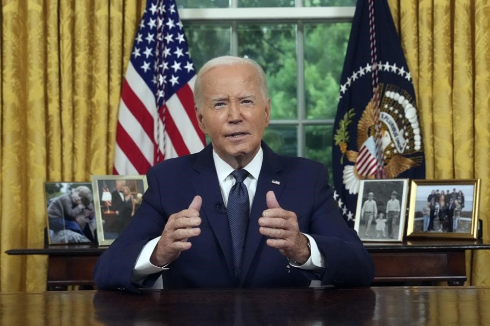 FILE - President Joe Biden addresses the nation from the Oval Office of the White House in Washington, Sunday, July 14, 2024, about the assassination attempt of Republican presidential candidate former President Donald Trump at a campaign rally in Pennsylvania. President Joe Biden will address the nation from the Oval Office on Wednesday on his decision to drop his 2024 Democratic reelection bid. (Erin Schaff/The New York Times via AP, Pool)