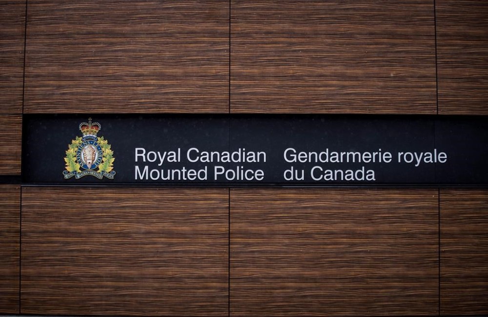 The British Columbia couple whose remains recently washed ashore on Nova Scotia's remote Sable Island have been identified as 70-year-old James Brett Clibbery and his 54-year-old wife, Sarah Packwood. The RCMP logo is seen outside Royal Canadian Mounted Police
