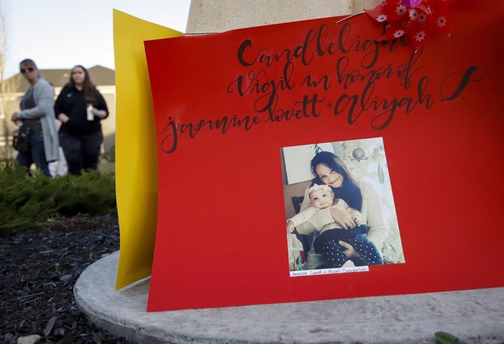 Alberta's top court has upheld the conviction of a Calgary man who admitted to killing his girlfriend and was also found guilty in her daughter's death. Mourners attend a candlelight vigil for Jasmine Lovett and Aliyah Sanderson in Calgary, Sunday, May 12, 2019. THE CANADIAN PRESS/Jeff McIntosh