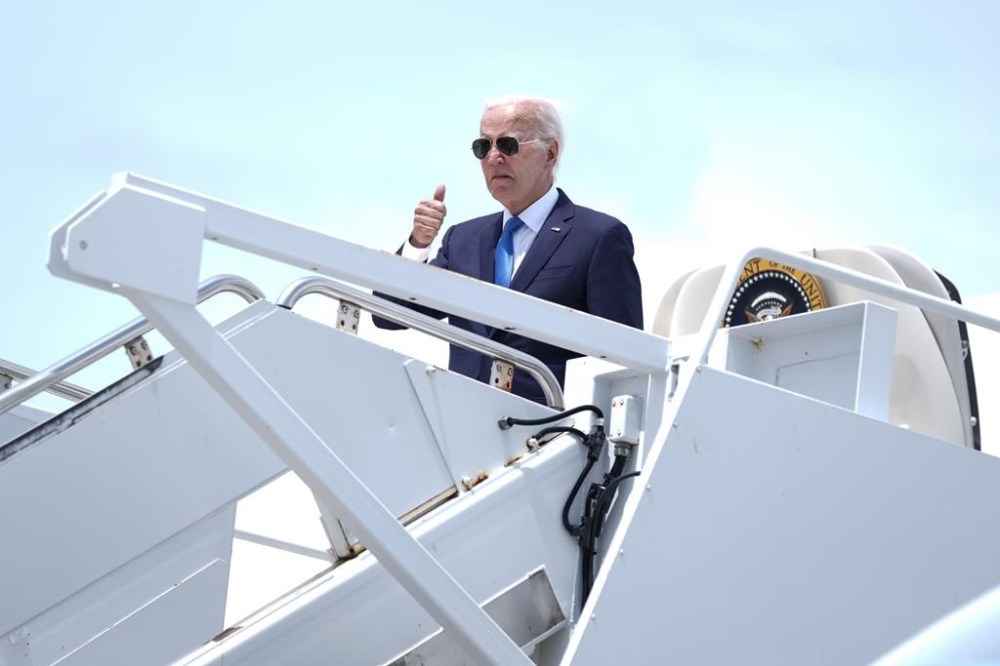 President Joe Biden boards Air Force One at Dover Air Force Base, in Dover, Del., Tuesday, July 23, 2024. Biden is returning to the White House from his Rehoboth Beach home after recovering from a COVID-19 infection. (AP Photo/Manuel Balce Ceneta)