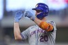 New York Mets' Pete Alonso gestures back to the dugout as he celebrates a base hit during the fourth inning of a baseball game against the Miami Marlins, Sunday, July 21, 2024, in Miami. (AP Photo/Wilfredo Lee)