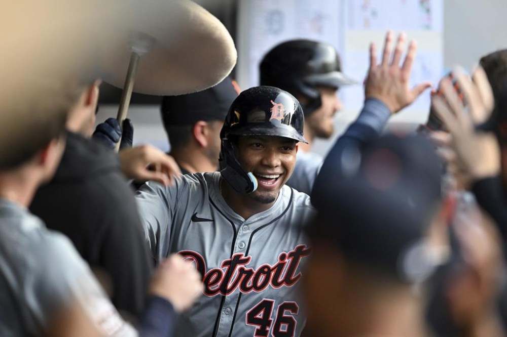 Detroit Tigers' Wenceel Pérez celebrates with teammates after hitting a two-run home run during the fourth inning of a baseball game against the Cleveland Guardians, Tuesday, July 23, 2024, in Cleveland. (AP Photo/Nick Cammett)