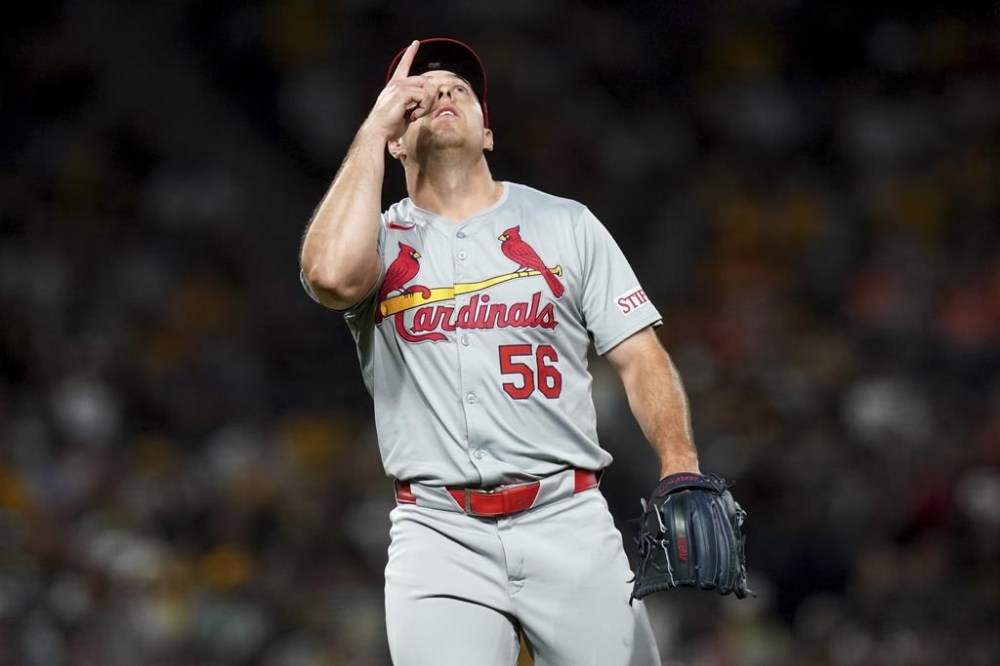 St. Louis Cardinals relief pitcher Ryan Helsley reacts after getting the final out of his team's win over the Pittsburgh Pirates in a baseball game Tuesday, July 23, 2024, in Pittsburgh. (AP Photo/Matt Freed)