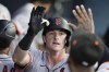 San Francisco Giants' Tyler Fitzgerald celebrates in the dugout after his solo home run during the second inning of a baseball game against the Los Angeles Dodgers, Tuesday, July 23, 2024, in Los Angeles. (AP Photo/Marcio Jose Sanchez)