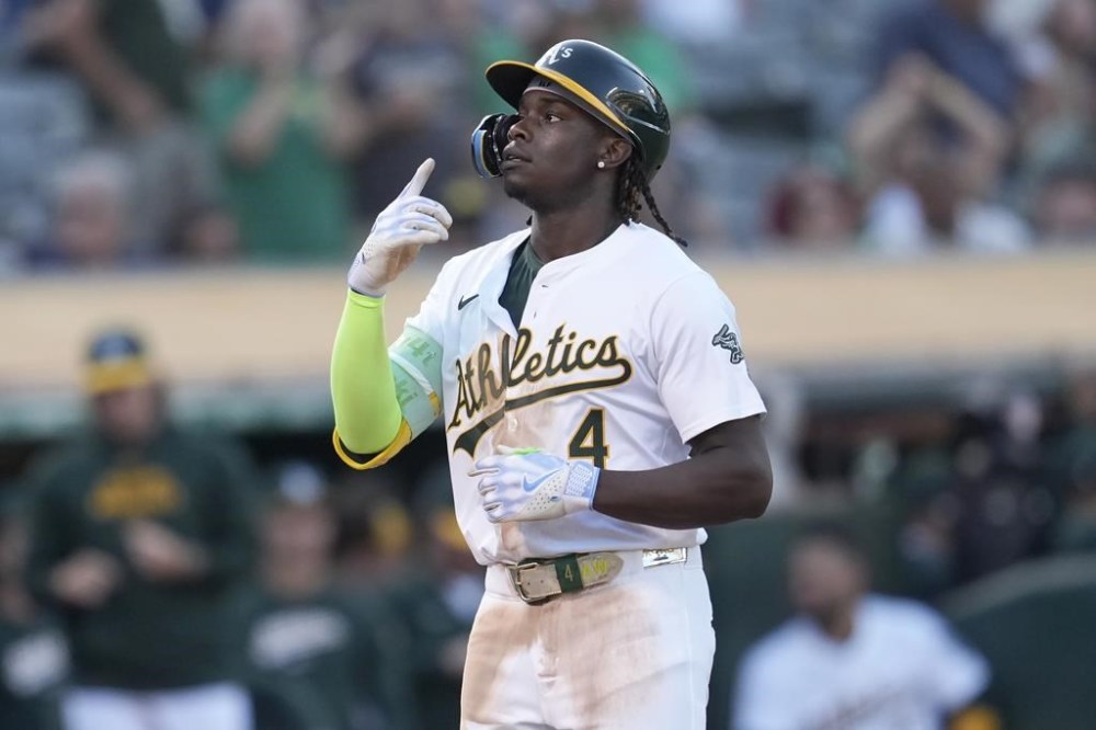 Oakland Athletics' Lawrence Butler gestures after hitting a home run against the Houston Astros during the third inning of a baseball game in Oakland, Calif., Tuesday, July 23, 2024. (AP Photo/Jeff Chiu)