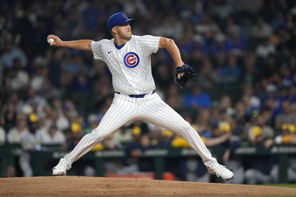 Chicago Cubs starting pitcher Jameson Taillon delivers during the first inning of a baseball game against the Milwaukee Brewers on Tuesday, July 23, 2024, in Chicago. (AP Photo/Charles Rex Arbogast)