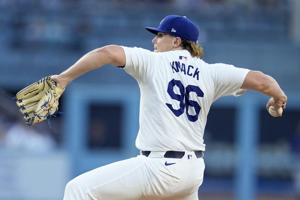 Los Angeles Dodgers starting pitcher Landon Knack throws to a San Francisco Giants batter during the first inning of a baseball game Tuesday, July 23, 2024, in Los Angeles. (AP Photo/Marcio Jose Sanchez)