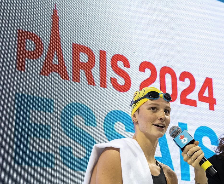 Summer McIntosh speaks to the crowd after winning the women's 200-metre butterfly at the Canadian Olympic Swim Trials in Toronto on Saturday, May 18, 2024. THE CANADIAN PRESS/Frank Gunn
