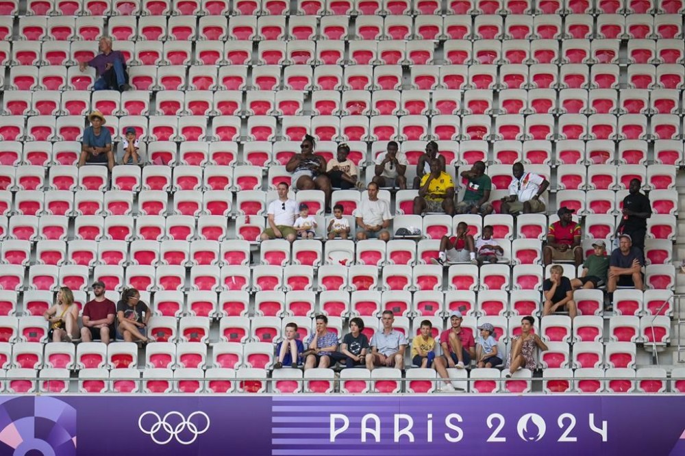Spectators watch a men's group A match between Guinea and New Zealand at Nice Stadium at the 2024 Summer Olympics, Wednesday, July 24, 2024, in Nice, France. New Zealand won 2-1. (AP Photo/Julio Cortez)