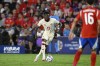 Canada midfielder Alphonso Davies (19) controls the ball against Chile during the second half of a Copa America Group A soccer match, Saturday, June 29, 2024, in Orlando, Fla. Canadians Davies, Jonathan David and Adriana Leon are up for CONCACAF Player of the Year.THE CANADIAN PRESS/AP/Phelan M. Ebenhack