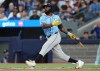 Tampa Bay Rays' Randy Arozarena (56) hits an RBI single against the Toronto Blue Jays during sixth inning American League MLB baseball action in Toronto on Wednesday, July 24, 2024. THE CANADIAN PRESS/Chris Young